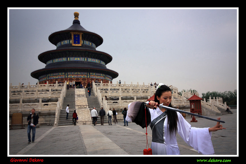 Model with a sword in front Temple of Heaven